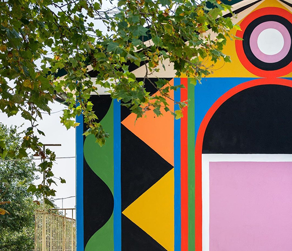 A Doorway: Agostino Iacurci signs a new striking mural in Italy