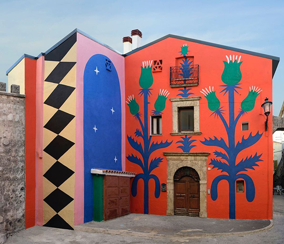 Agostino Iacurci signs a new colourful mural in Italy for Borgo Universo Festival