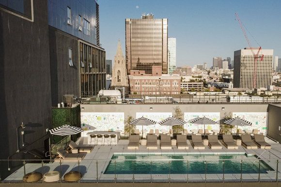 Capturing the LA Downtown Scene: Jonathan Calugi’s mural at The Crosby’s rooftop